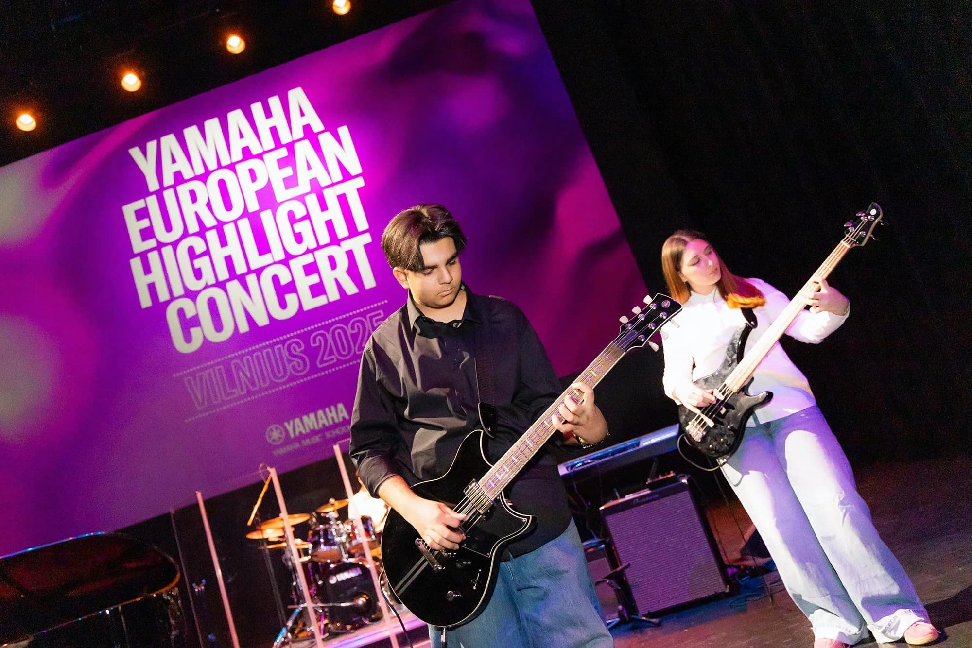 Young musicians performing on stage