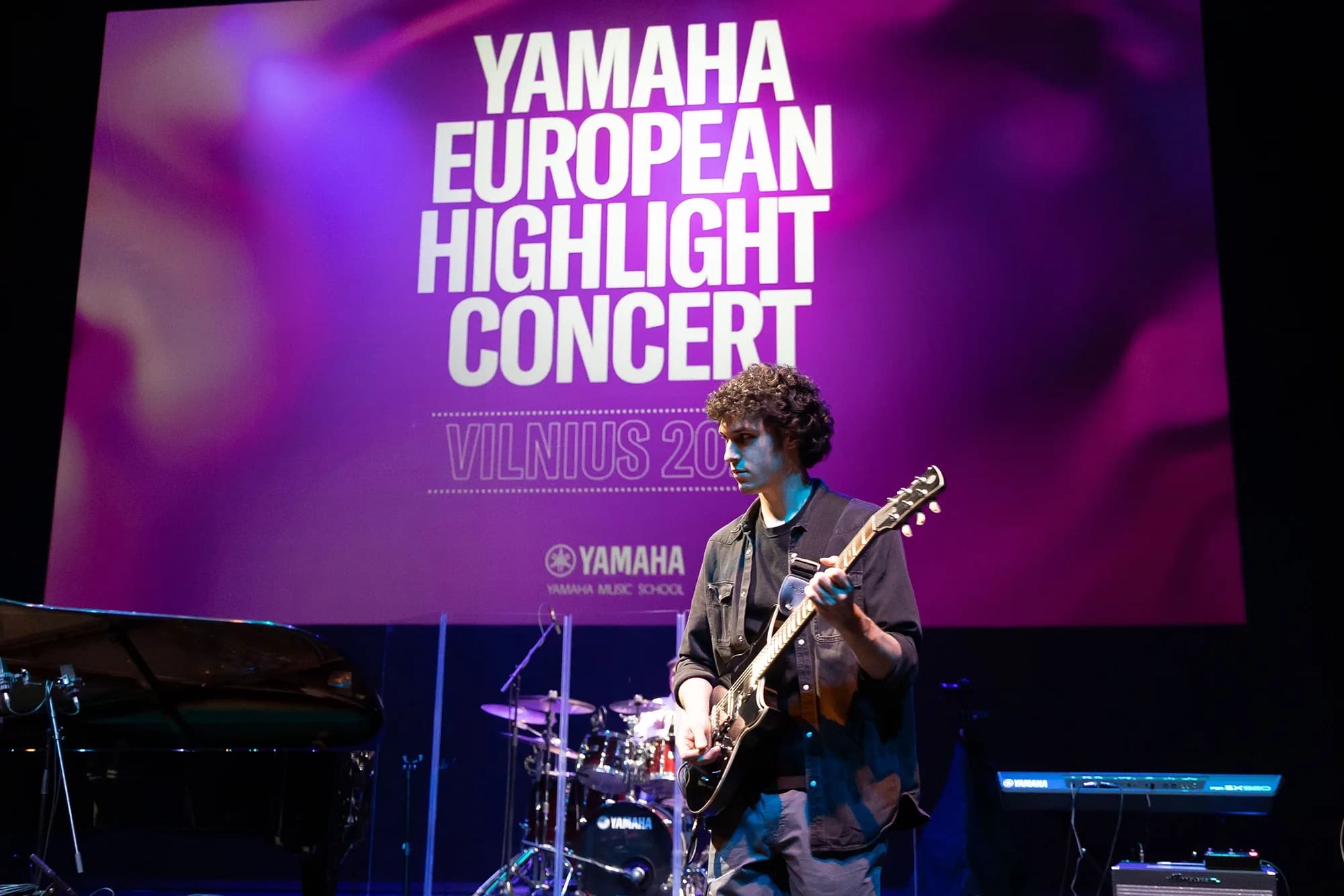 Young musicians performing on stage