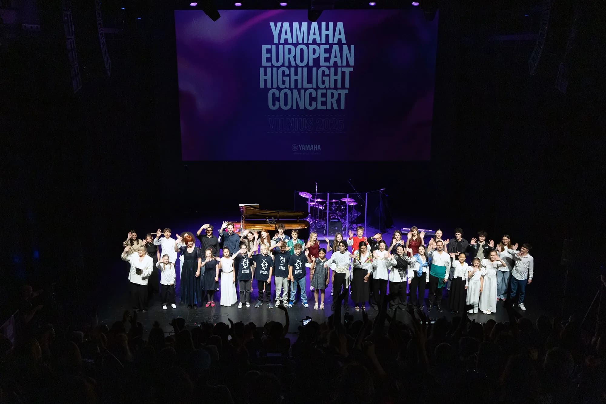Young musicians performing on stage